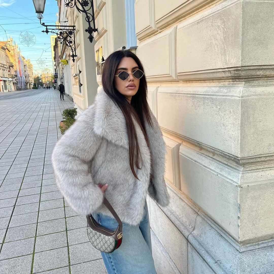 Eleganter Kunstpelzmantel